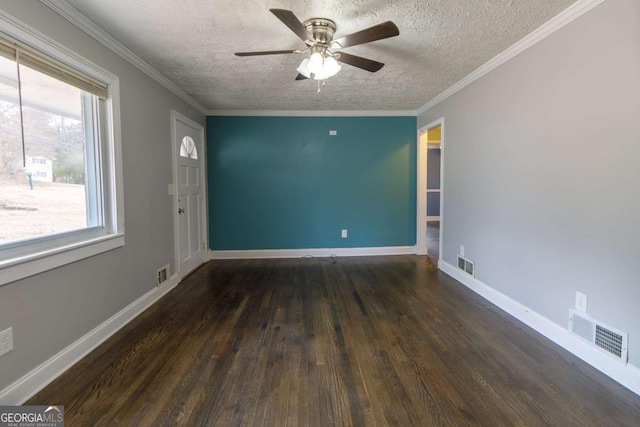 unfurnished room with ceiling fan, ornamental molding, dark hardwood / wood-style floors, and a textured ceiling