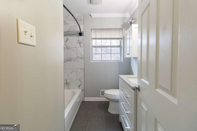 full bathroom with vanity, tiled shower / bath, crown molding, and toilet