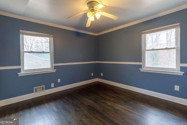 spare room featuring crown molding, ceiling fan, and dark hardwood / wood-style flooring