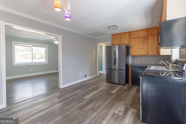 kitchen with dishwasher, backsplash, stainless steel fridge, and a textured ceiling