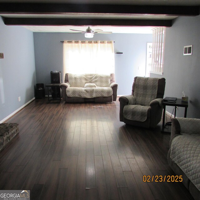 bedroom with ceiling fan, carpet, and a textured ceiling