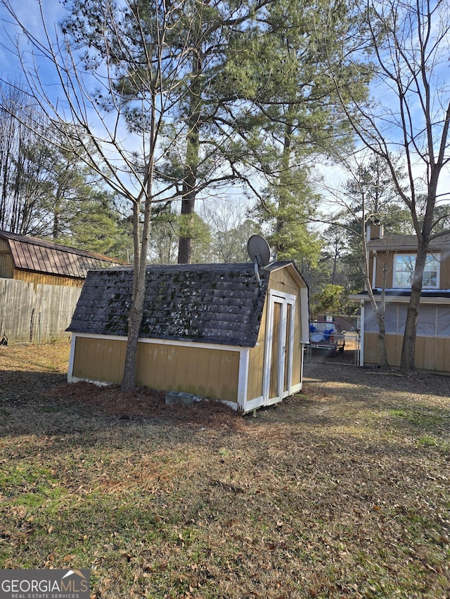 exterior space featuring a storage shed