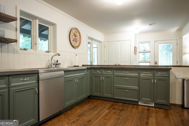 kitchen featuring dishwasher, sink, backsplash, dark hardwood / wood-style flooring, and green cabinets