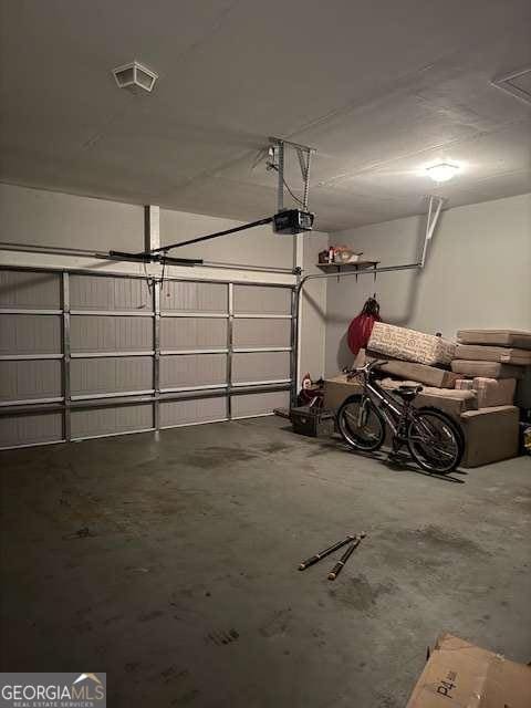 garage with a garage door opener