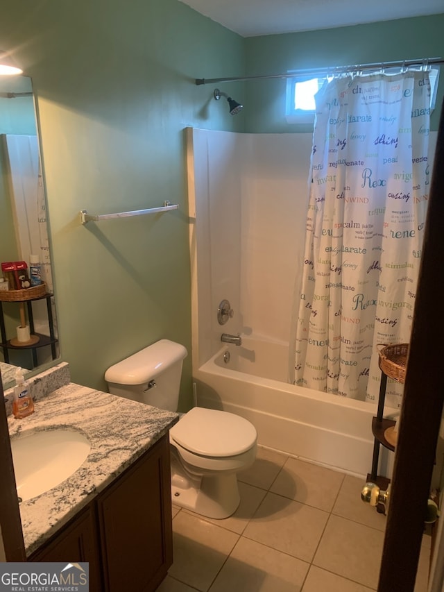 full bathroom featuring tile patterned floors, toilet, vanity, and shower / bath combo