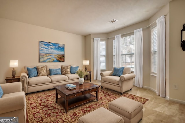 living room with light colored carpet