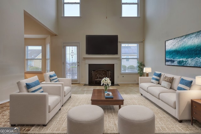 living room with a towering ceiling