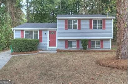 split level home with a front yard