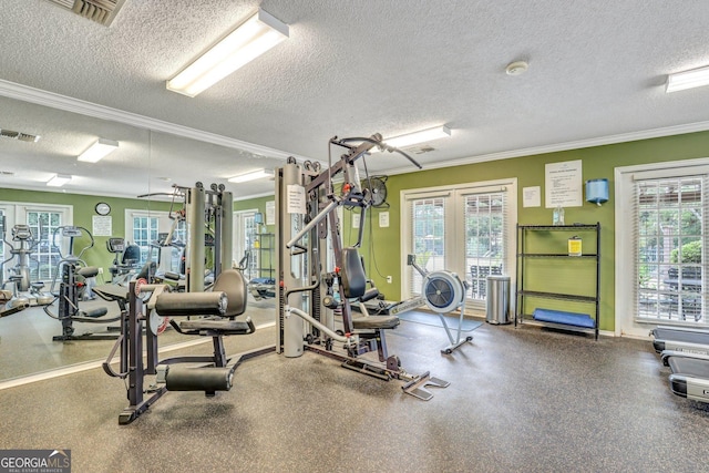 gym featuring crown molding, a healthy amount of sunlight, french doors, and a textured ceiling