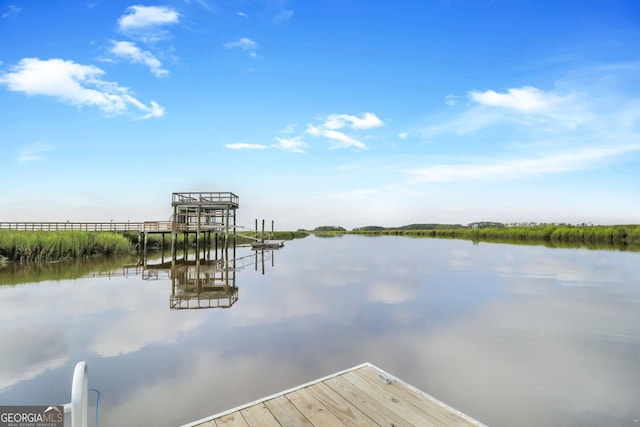 view of dock with a water view