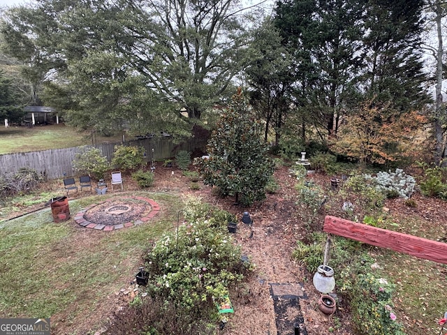 view of yard featuring fence