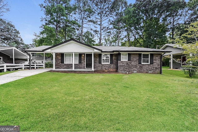 ranch-style house featuring a carport and a front yard