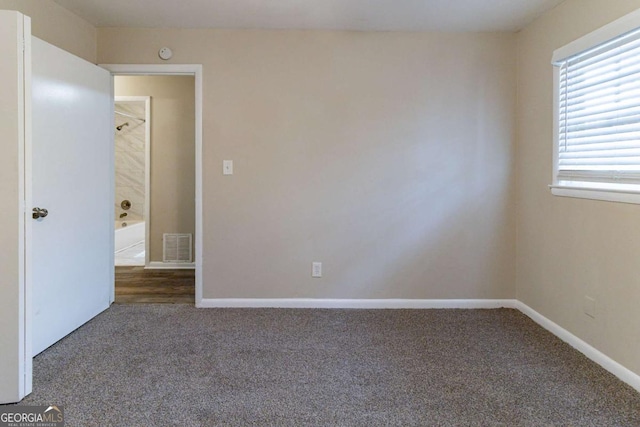 view of carpeted spare room