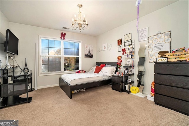 bedroom with baseboards, visible vents, carpet flooring, and an inviting chandelier