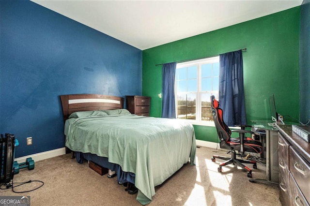 carpeted bedroom with baseboards