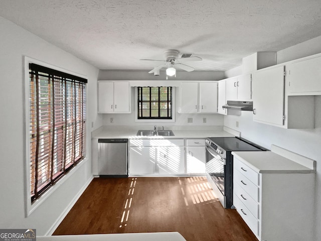 2268 Turtle Club Dr NE, Marietta, GA 30066 - kitchen featuring stainless steel appliances, under cabinet range hood, dark wood-type flooring, a ceiling fan, and white cabinetry