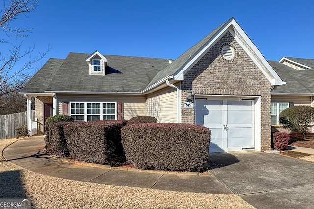 view of front of property with a garage