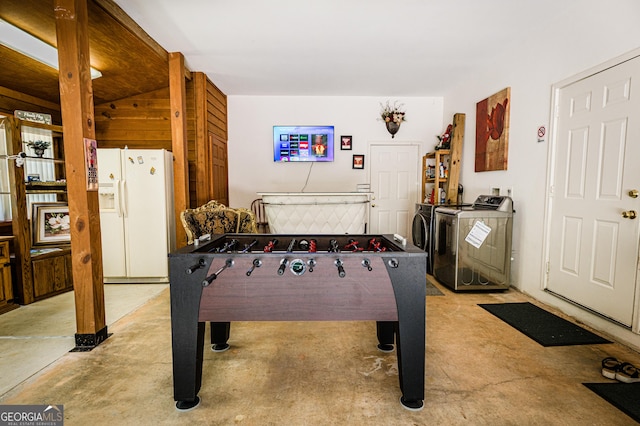 game room with washing machine and dryer