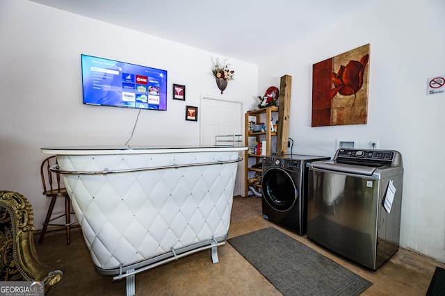 laundry area with washer and dryer