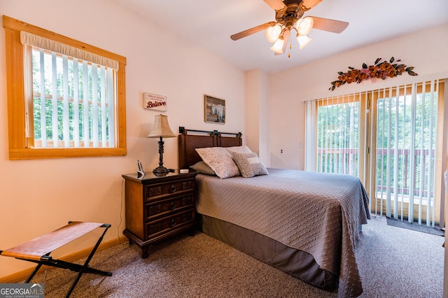 bedroom with access to exterior, ceiling fan, and carpet flooring