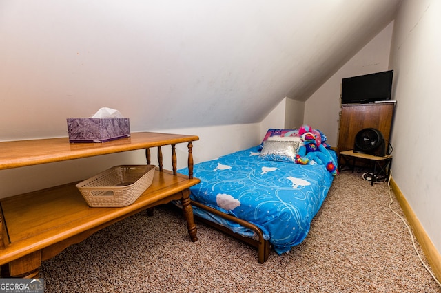 carpeted bedroom with vaulted ceiling