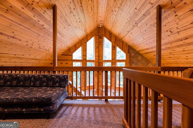 unfurnished room with wood ceiling, lofted ceiling with beams, and carpet