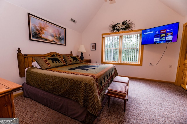 carpeted bedroom featuring vaulted ceiling