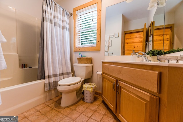 full bathroom with vanity, toilet, and shower / tub combo