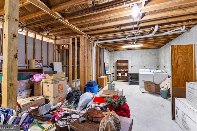 basement featuring washing machine and dryer