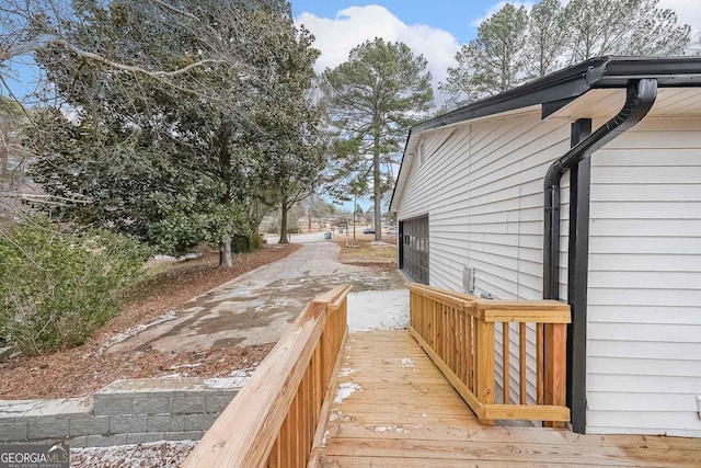 view of side of property with a deck