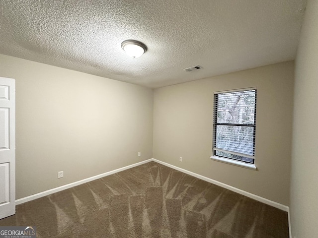 3880 Springleaf Ct, Stone Mountain, GA 30083 - unfurnished room featuring carpet flooring and a textured ceiling