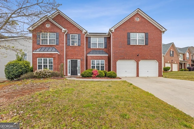 view of front of home with a garage and a front yard