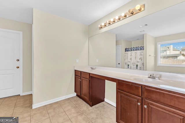 bathroom featuring vanity and tile patterned floors