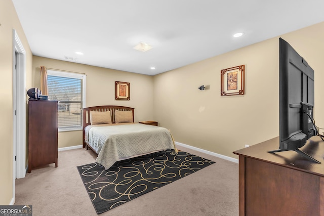 bedroom with light carpet