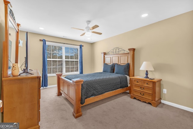 carpeted bedroom featuring ceiling fan