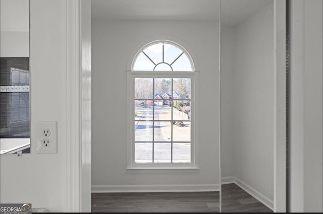 doorway to outside with dark hardwood / wood-style flooring