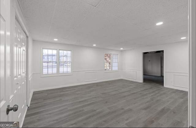 unfurnished room featuring hardwood / wood-style flooring