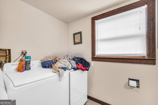 washroom with separate washer and dryer