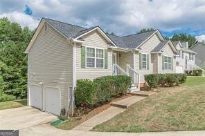 split foyer home featuring a garage