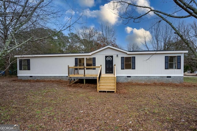 view of front of property with a deck