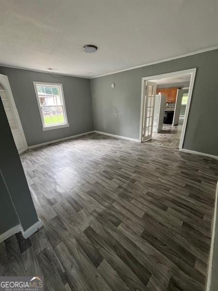 4402 Highland Rd, Decatur, GA 30035 - empty room with dark wood-style flooring and crown molding