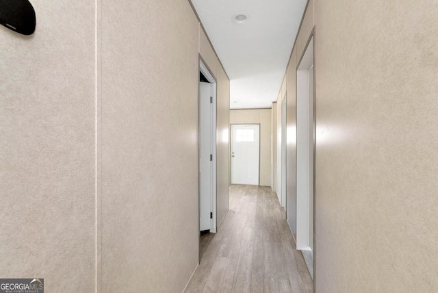 hallway featuring light wood-type flooring