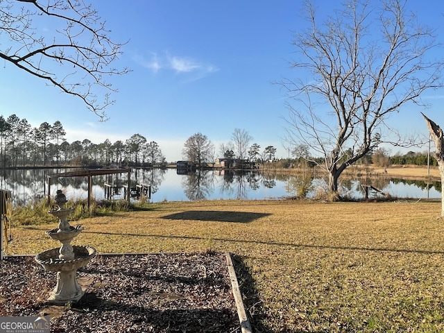 view of yard with a water view