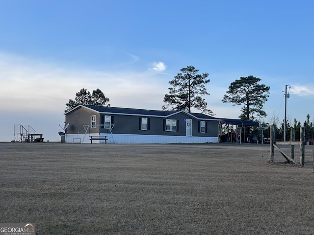 manufactured / mobile home featuring a carport