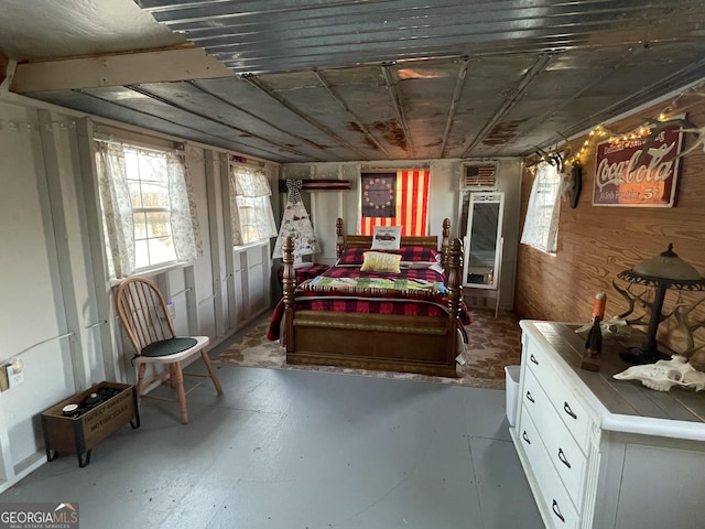 bedroom with wooden walls