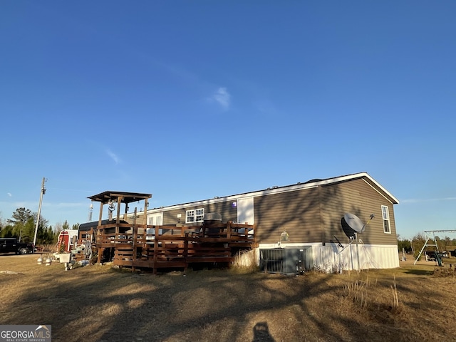 view of side of home with cooling unit