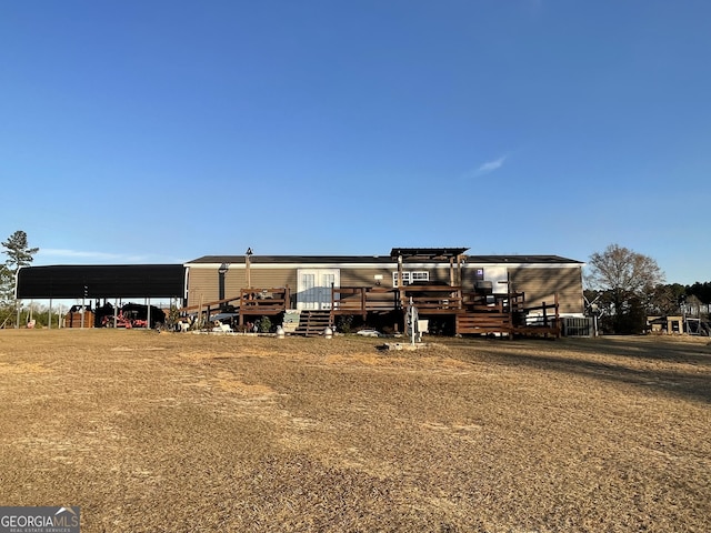 exterior space featuring a carport