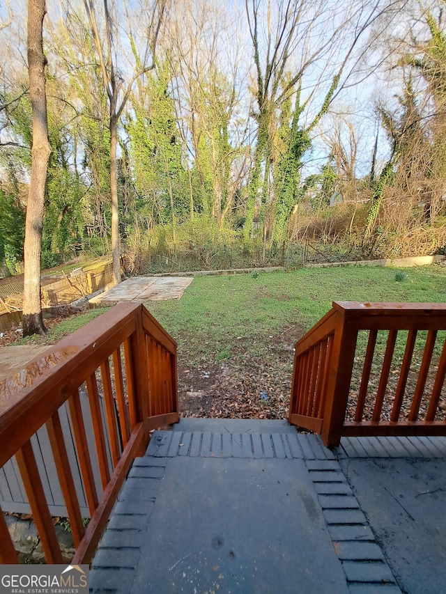 1290 Elizabeth Ave SW, Atlanta, GA 30310 - wooden deck featuring a lawn and a patio area