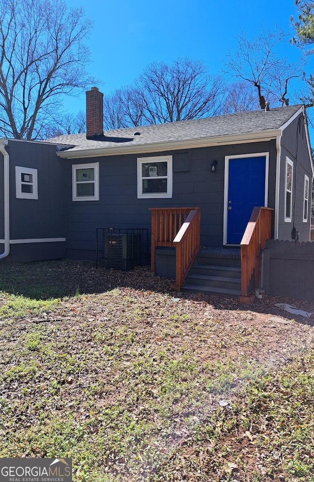 1290 Elizabeth Ave SW, Atlanta, GA 30310 - back of house featuring a chimney and roof with shingles