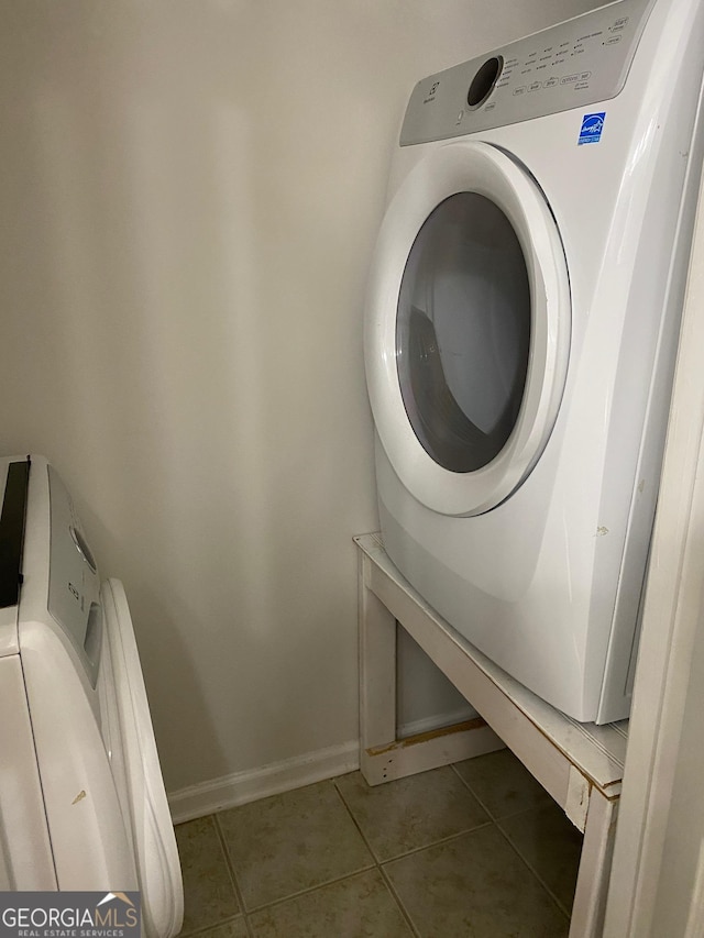 172 Sonata Cir, Pooler, GA 31322 - laundry room with washer / clothes dryer and light tile patterned flooring